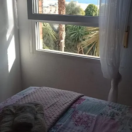 En Frente Del Puerto בית אירוח