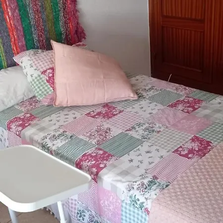 En Frente Del Puerto בית אירוח